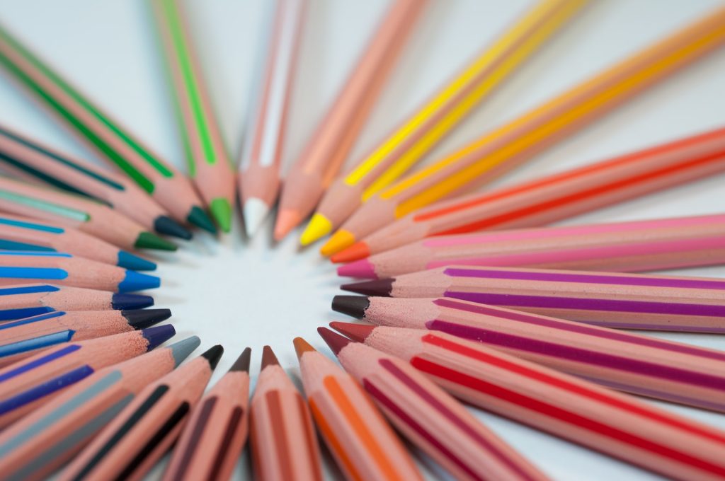 Image of an array of coloured pencils arranged in a circular and gradient fashion. Represenative of the different selection of IP types covered in the blog.