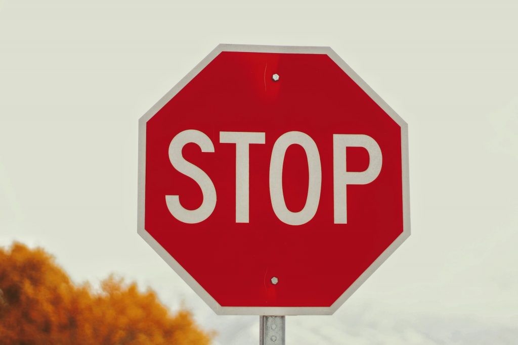 Image of a stop sign to suggest a requirement to halt!