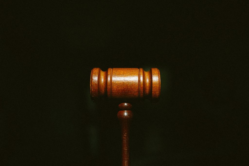 Image of a gavel, representing legal enforcement