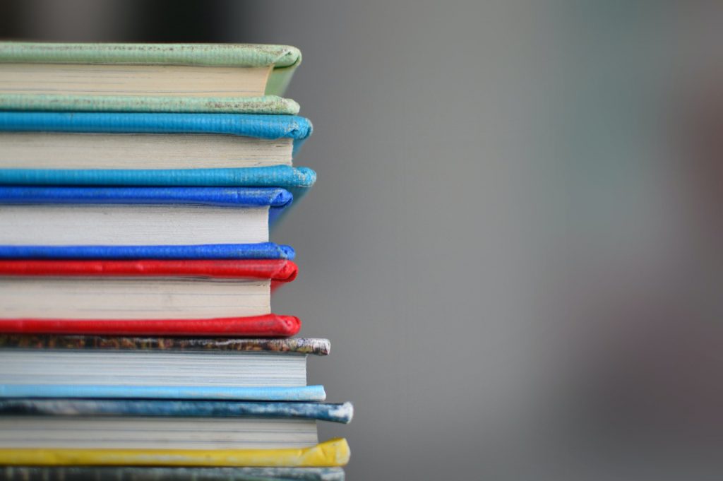 A stack of books, representative of a portfolio